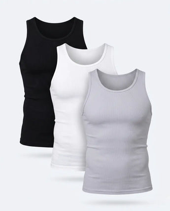 Three tank tops in black, white, and gray on a light gray background