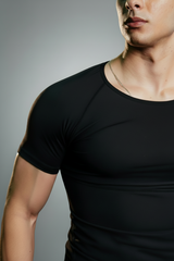 Man wearing the InShape Compression Undershirt against a studio background